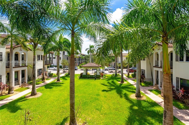 view of property's community featuring a gazebo and a yard