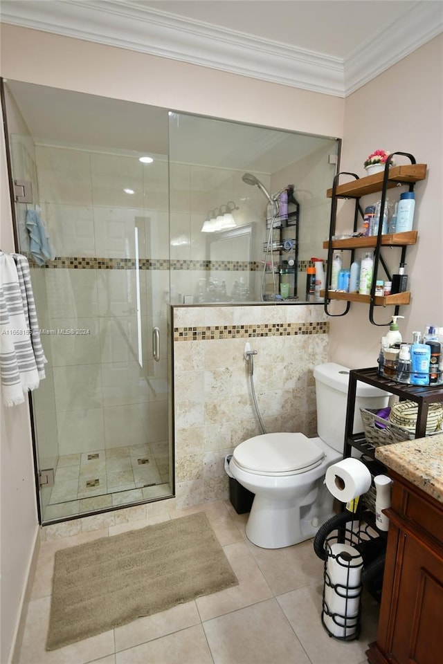 full bathroom featuring toilet, a stall shower, tile patterned floors, vanity, and ornamental molding
