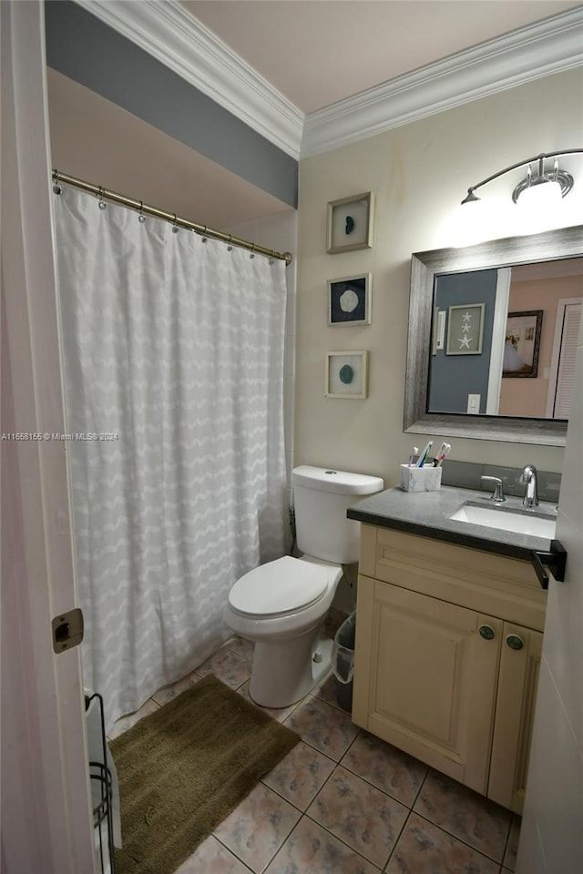 full bath featuring a shower with curtain, toilet, ornamental molding, tile patterned flooring, and vanity