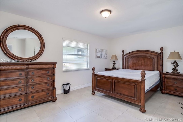 bedroom featuring light tile patterned floors