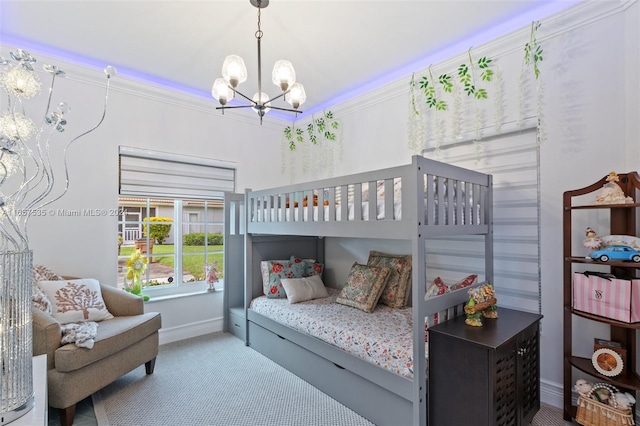 carpeted bedroom featuring ornamental molding and a chandelier