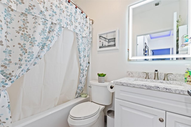 full bathroom with toilet, shower / bath combo, and vanity