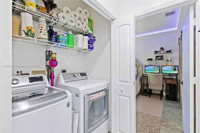 laundry area featuring washer and clothes dryer