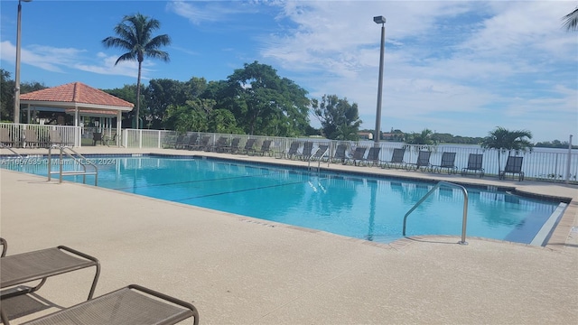 view of swimming pool featuring a patio area