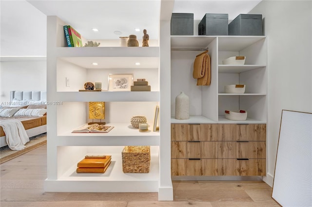 mudroom with light hardwood / wood-style flooring