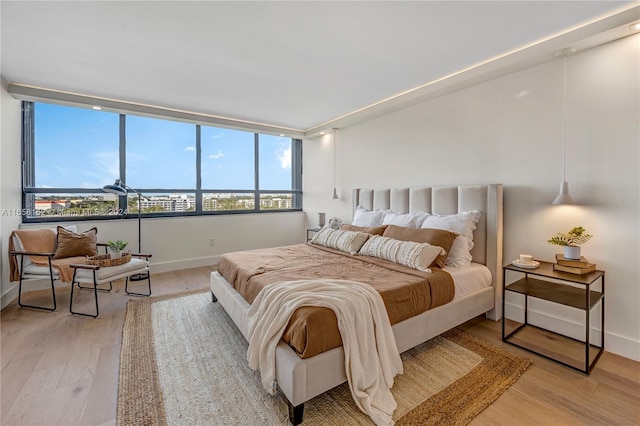 bedroom featuring hardwood / wood-style floors