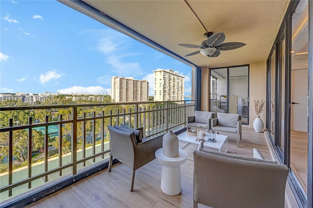 balcony featuring ceiling fan