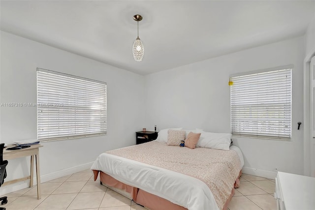 bedroom with light tile patterned flooring