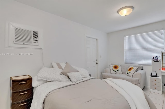 tiled bedroom featuring a wall unit AC