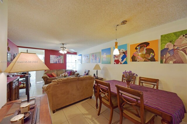 17560 Atlantic Blvd Unit 118, Sunny Isles Beach, FL 33160 - dining space with a textured ceiling, a ceiling fan, and light tile patterned floors