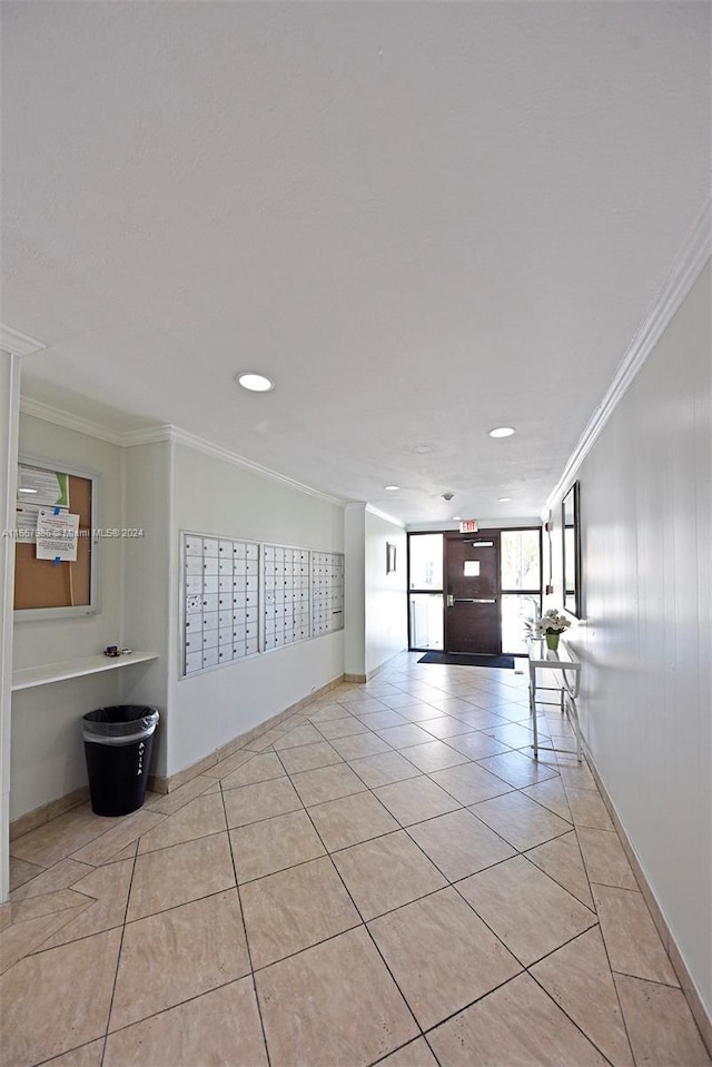 17560 Atlantic Blvd Unit 118, Sunny Isles Beach, FL 33160 - hall featuring mail area, ornamental molding, light tile patterned flooring, recessed lighting, and baseboards