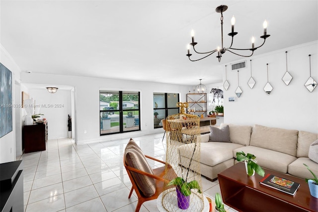 living room with an inviting chandelier and light tile patterned floors