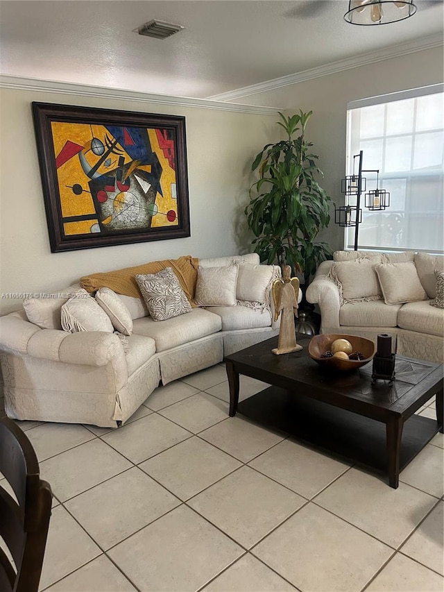 tiled living room with a textured ceiling and ornamental molding