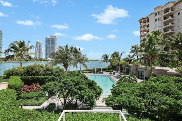 view of pool featuring a water view