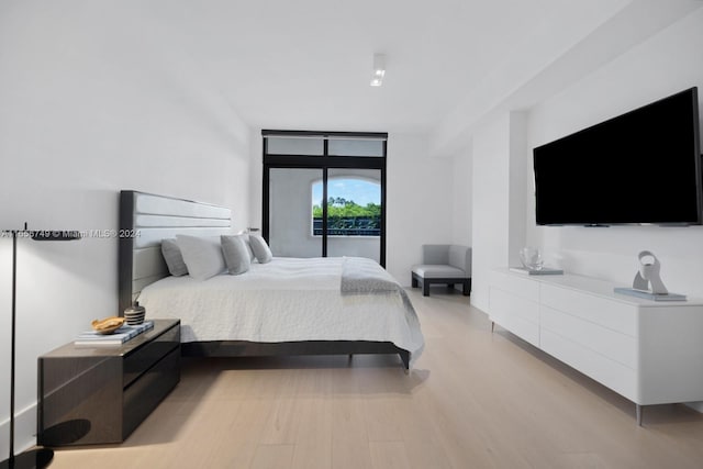 bedroom featuring light hardwood / wood-style floors