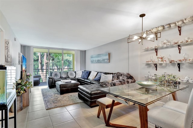 tiled living room with floor to ceiling windows and a notable chandelier