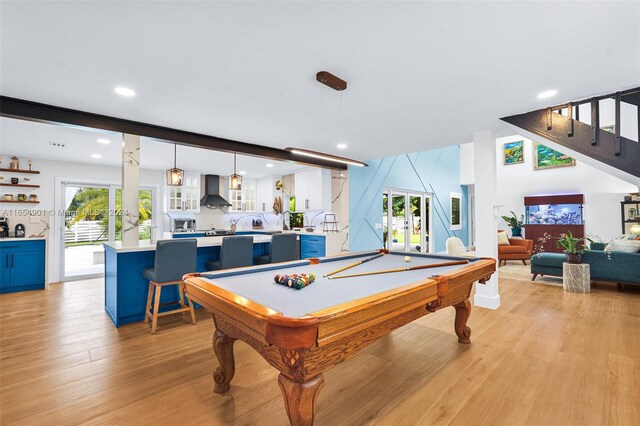 recreation room featuring billiards and light hardwood / wood-style floors