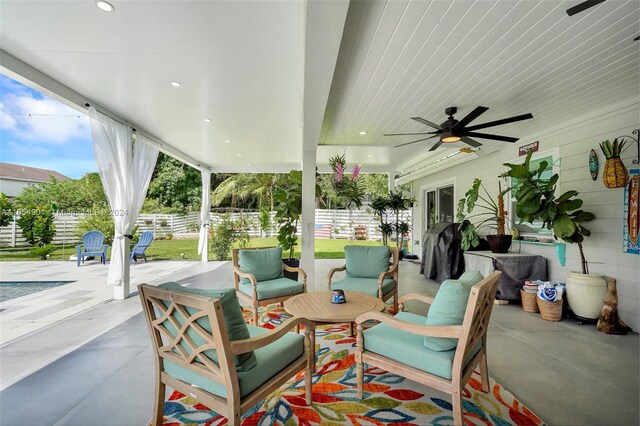 view of patio / terrace featuring ceiling fan