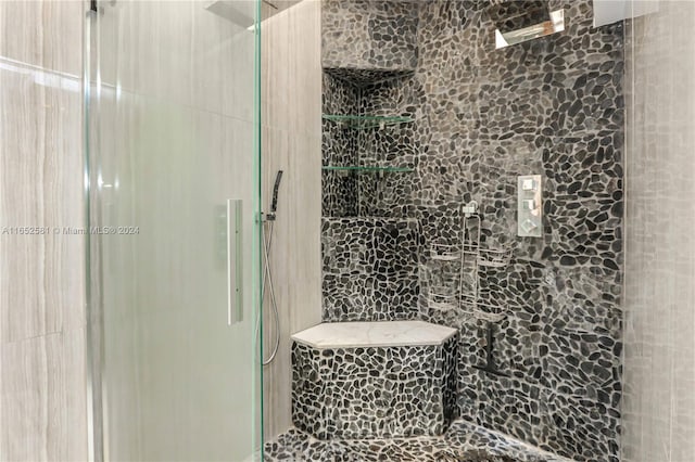 bathroom with an enclosed shower