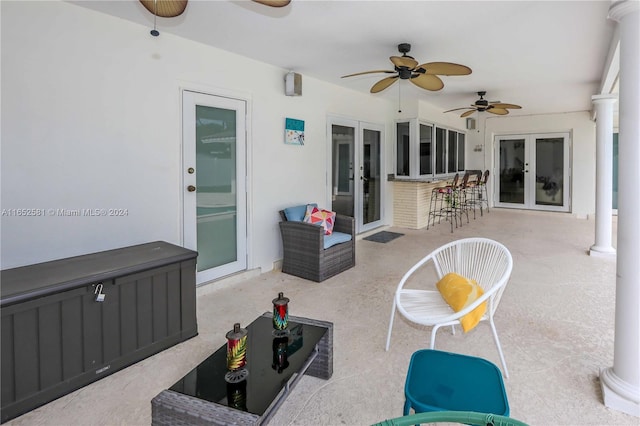 view of patio / terrace with french doors and ceiling fan