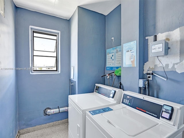 laundry room with independent washer and dryer