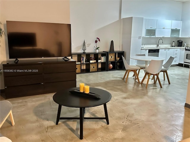 234 NE 3rd St Unit 204, Miami, FL 33132 - living area featuring finished concrete flooring
