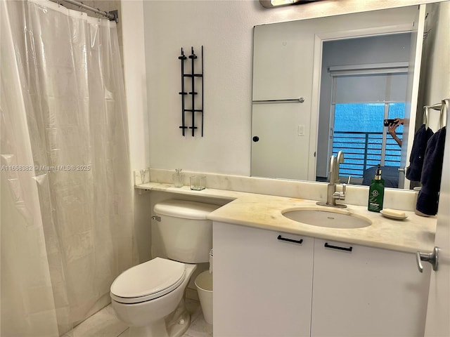234 NE 3rd St Unit 204, Miami, FL 33132 - full bathroom featuring toilet, vanity, and curtained shower