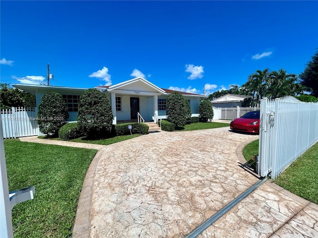 ranch-style house featuring a porch and a front yard