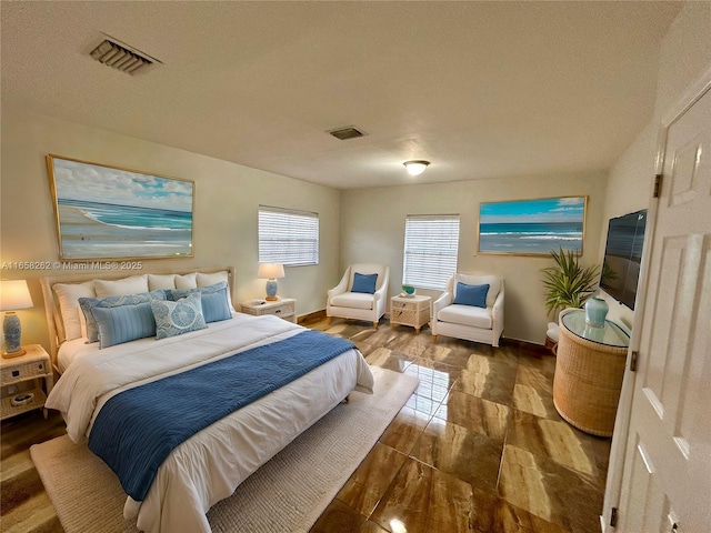 bedroom featuring a textured ceiling