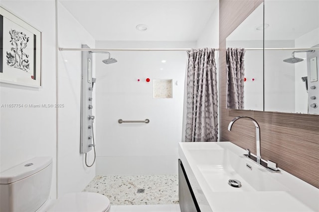 3551 E Glencoe St, Miami, FL 33133 - full bath featuring a tile shower, toilet, and vanity