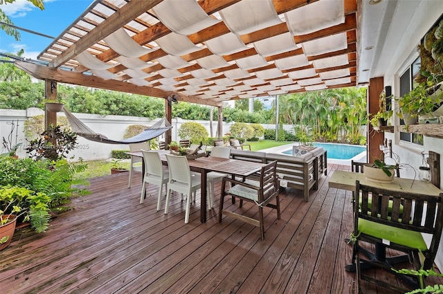 wooden terrace featuring an outdoor pool, a fenced backyard, outdoor dining space, and a pergola