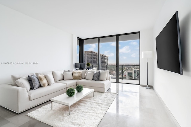 living room with floor to ceiling windows