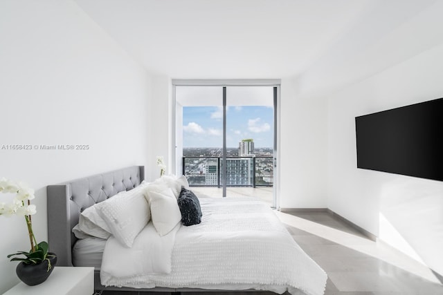 68 SE 6th St Unit 3706, Miami, FL 33131 - bedroom with a wall of windows and access to exterior