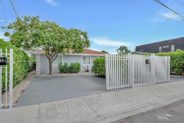 view of gate with fence