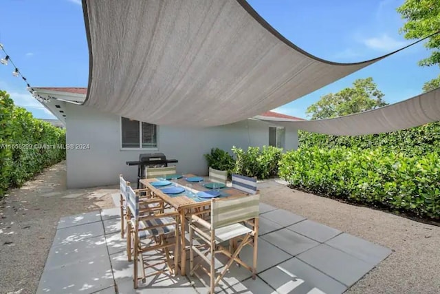 view of patio / terrace featuring outdoor dining space and area for grilling