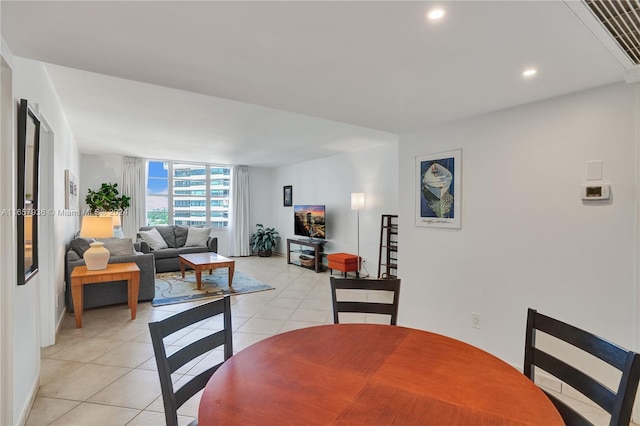 dining room featuring light tile patterned floors