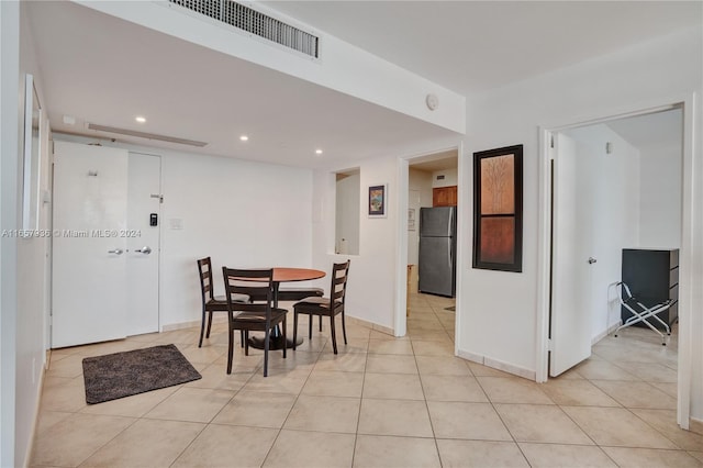 dining room featuring light tile patterned floors