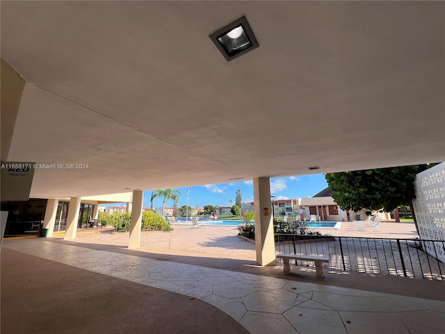 view of patio featuring a community pool