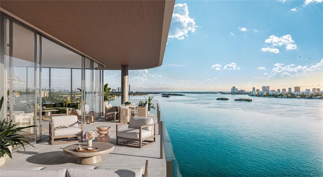 balcony featuring a water view