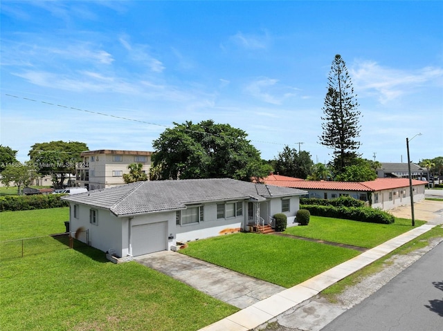 single story home with a garage and a front yard