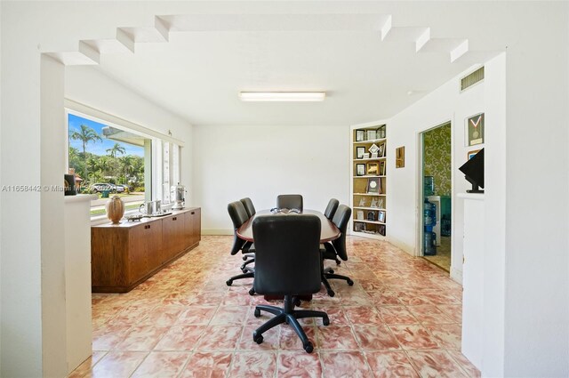 office space with light tile patterned floors