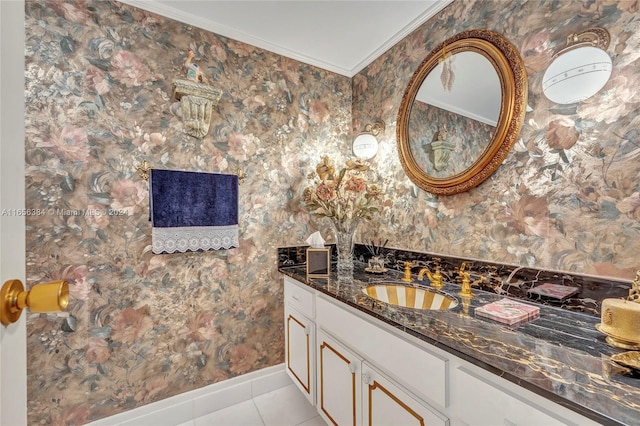 bathroom with tile patterned floors, crown molding, and vanity