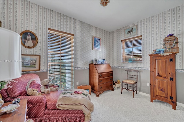 bedroom featuring light carpet