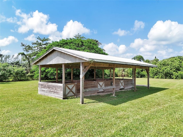 view of property's community featuring an outdoor structure