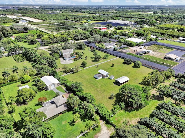 birds eye view of property featuring a rural view