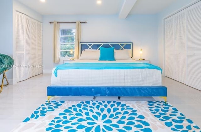 bedroom featuring a closet and beam ceiling