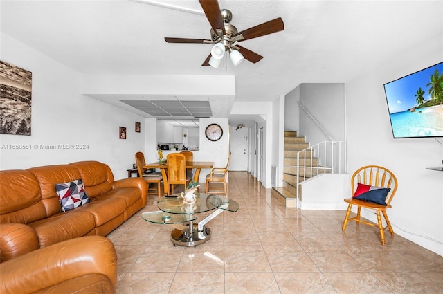 living room featuring ceiling fan