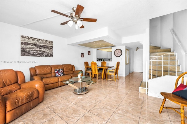 living room featuring ceiling fan