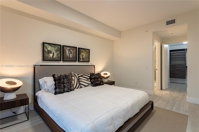 bedroom featuring hardwood / wood-style flooring