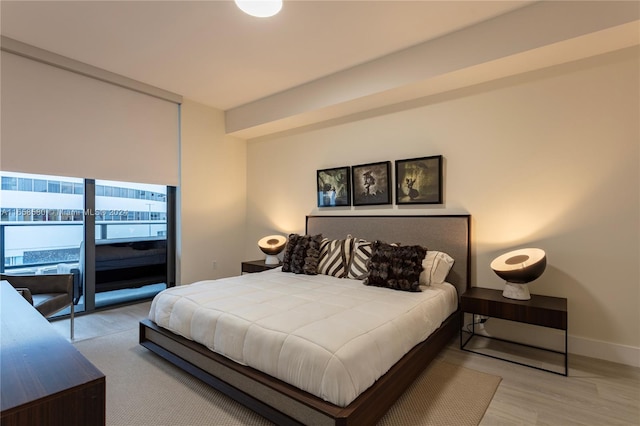 bedroom with wood-type flooring